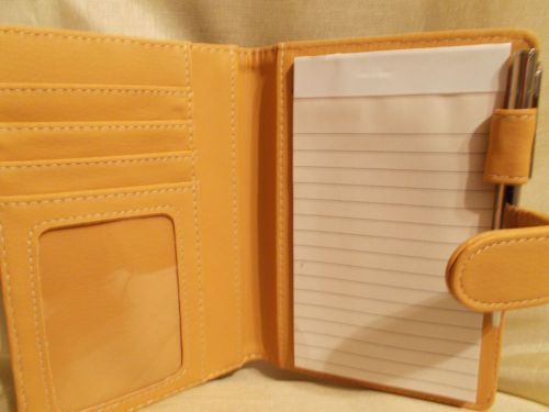 Avon 6&#034; x 4&#034; black and tan notepad holder with inside pockets, new $12 value! for sale