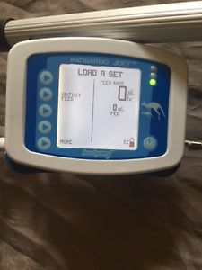 Covidien kangaroo joey enteral feeding pump , charger, pole clamp &amp; iv pole for sale