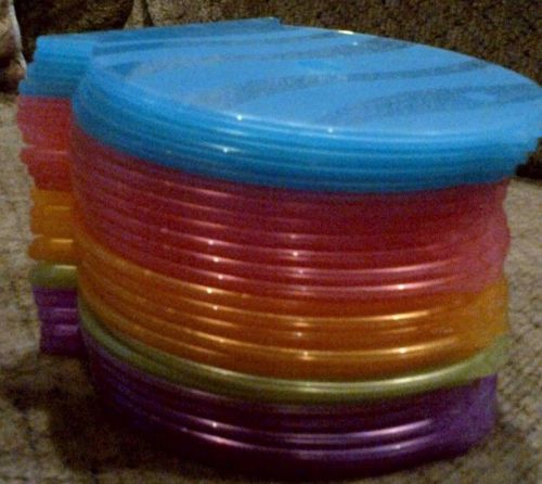 24 assorted color plastic fish-shaped CD cases
