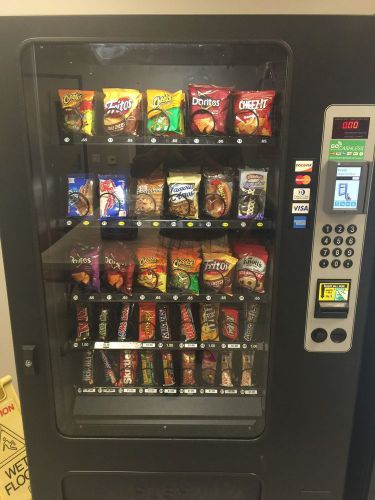 USI 3508 Five Wide Snack machine With Vend Screen Attached.