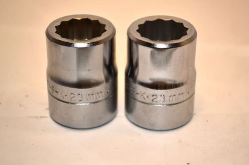 2 NOS SK TOOL USA 3/4&#034; Dr. 12 Pt. 23mm Regular Metric Chrome Sockets #K521 2A45