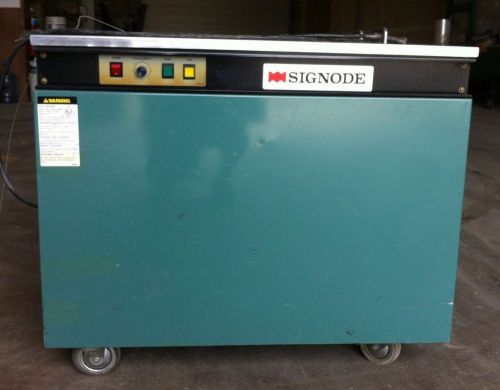 Signode strapping machine - package bander for sale