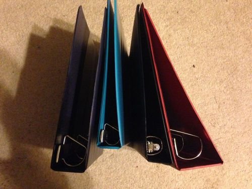Lot of 4 used 3 ring binders, various sizes