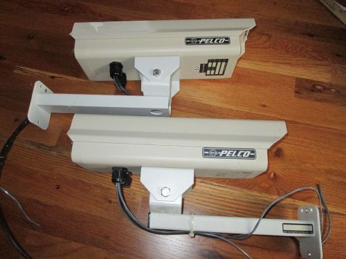 2 pelco outdoor video surveillance security camera housing w sony b&amp;w cameras for sale