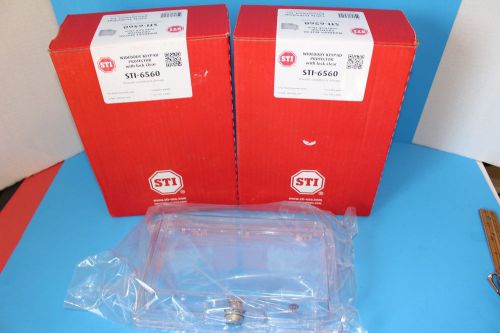 TWO STI WIDEBODY KEYPAD PROTECTOR WITH LOCK (CLEAR) NIB