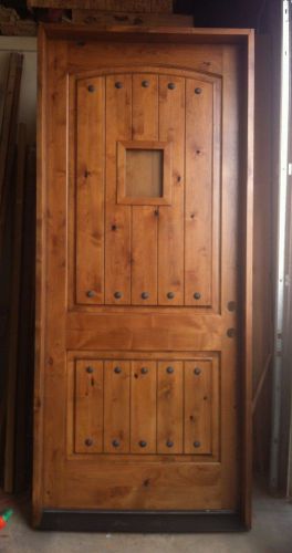 Knotty Alder Single 3680 Rustic Door Old World Design speak easy Iron Grills