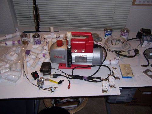 Robinair 2 stage vacuum pump model 15500 5 cfm 1/3 hp in great shape with parts for sale