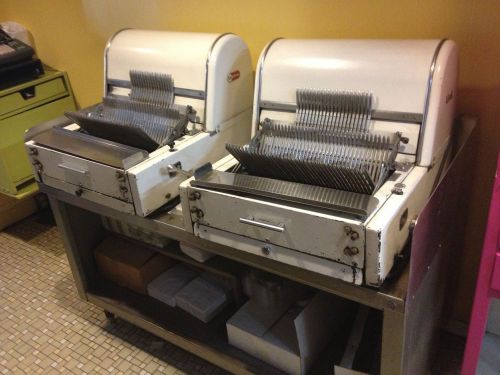 Two Table Top Berkel Slicers with Stainless Steel Table