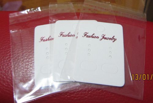 15 white earring display cards with seal-able cellophane bags new for sale