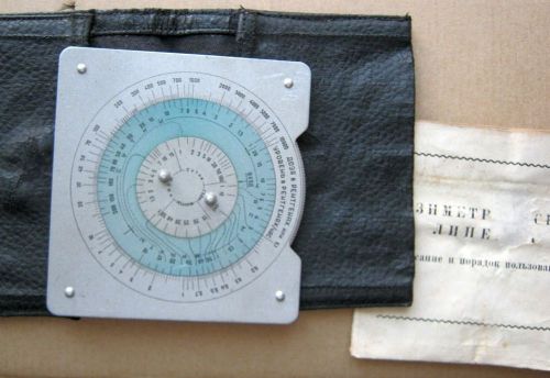 Echoes of cold war-old soviet USSR military dosimetric scale circular slide rule