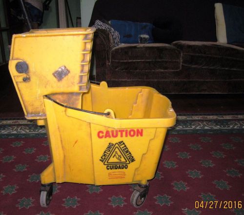 Rubbermaid 35 quart yellow wringer mop bucket for sale