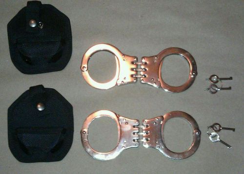 (2 SETS OF) NICKEL HINGED DOUBLE LOCK POLICE HANDCUFFS W/ KEYS