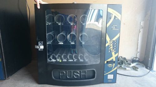 vending machine NOT SELLING ONLINE. CALL 2107896121. $600-machine read discrip.