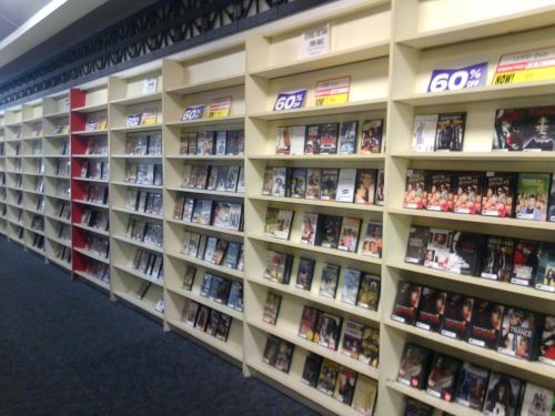 Video store shelving unit to hold dvds or tapes 48 inches wide by 88 inches tall for sale