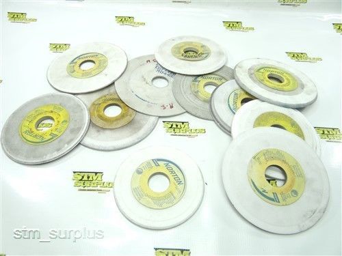 Lot of 11 norton grinding wheels 5-1/4&#034; to 6-1/2&#034; with 1-1/4&#034; bore for sale