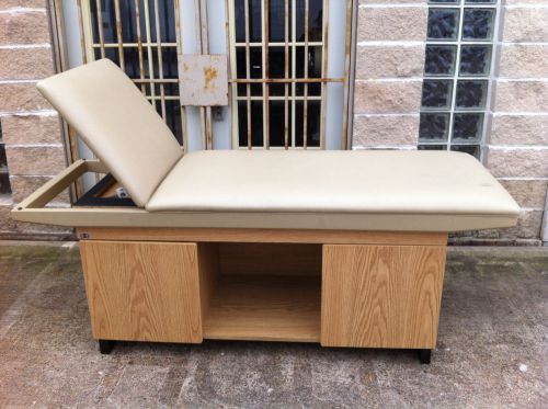 Hausmann industries liftback treatment table w/ storage compartments for sale