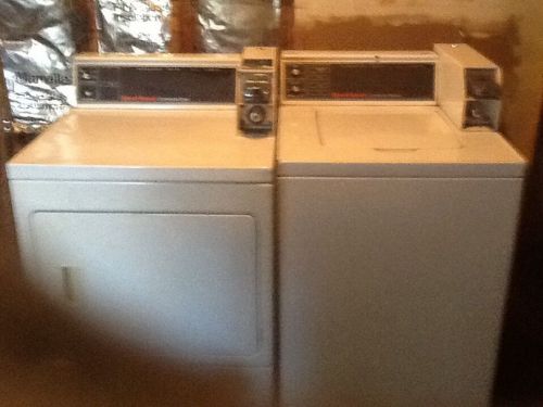 Coin operated washer and dryer