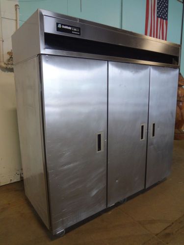 COMMERCIAL HEAVY DUTY &#034; DELFIELD &#034; STAINLESS STEEL 3 DOORS REFRIGERATOR W/CASTER