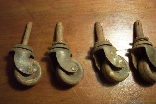 Set of 4 vintage metal swivel casters, 1 1/2 &#034; wheel, 1-1/2&#034; stem for sale