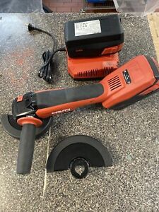 HILTI AG 600-A36 CORDLESS ANGLE GRINDER, , 2 BATTERIES &amp; charger used twice .