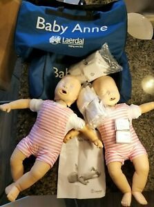 2 x Laerdal Baby Anne Infant CPR Training Manikin W Extras Bag lung bags manual