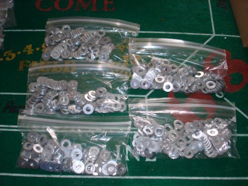 500- 1/4 INCH STEEL FLAT WASHERS (ZINC)