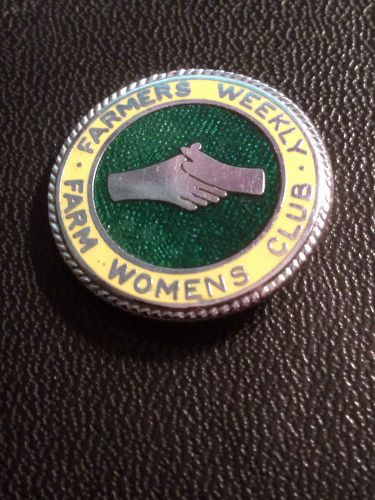 A NICE FARMERS WEEKLY ENAMEL BADGE .