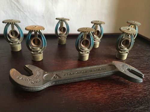 Lot of 7 (1)vintage f799 grinnell spkr wrench (6) brass sprinkler heads for sale