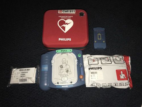 Philips defibrillator (aed) w/ case brand new battery and pads  hs1 for sale