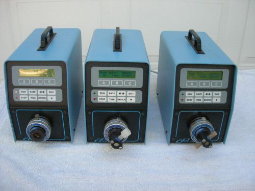 COLE PARMER PISTON METERING PUMPS WITH FLUID METERING INC. HEADS SCILOG EXPERT