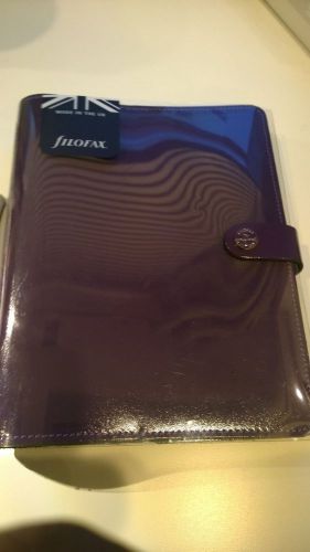 The original organizer patent purple by filofax a5  made in the united kingdom for sale