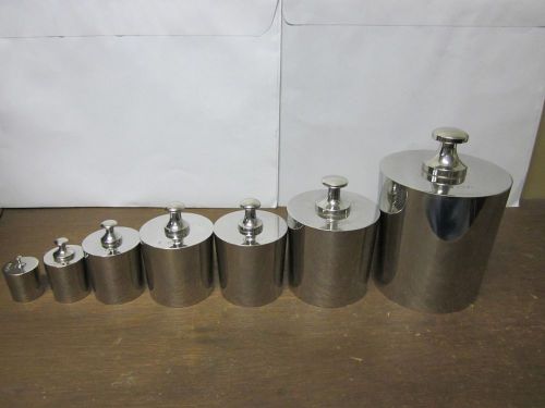 7 USED TEST WEIGHTS 100G, 200G, 500G, 1Kilo (2), 2Kilo, 5Kilo stainless steel