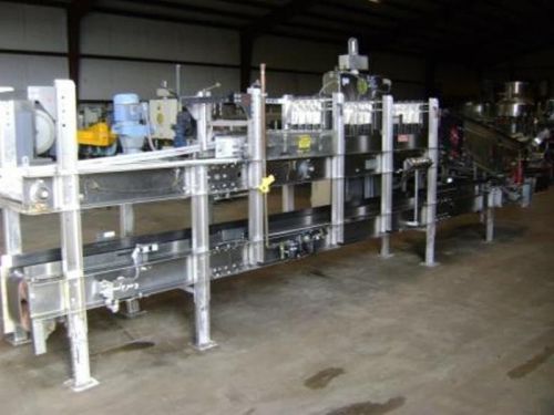 Hartness 2600 stainless continuous motion bottle case packer, packing machine for sale