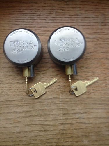 TWO(2) HIDDEN SHACKLE- HOCKEY PUCK PADLOCKS - &#034;NEW&#034; -- KEYED ALIKE- (4)KEYS