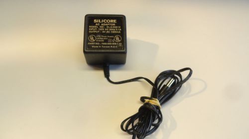 T8:  Silicore Sla40810 8 v ac 1000ma ac adapter power supply 7900-000-009-1.00