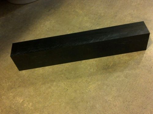 Black Acetal Plastic bar 1-1/2&#034; X 2&#034; X 11-1/4&#034; long.