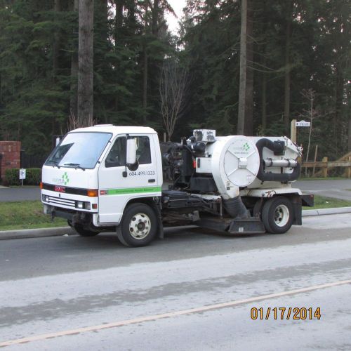 1994 tymco 210  on GMC w4 diesel Street sweeper