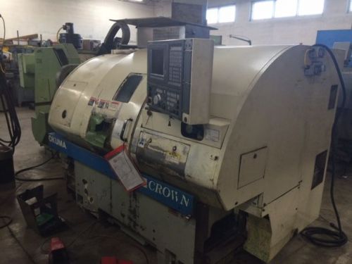 Okuma crown cnc lathe. 2000 l1060-bb cnc turning center big bore w/ lns 12&#039; feed for sale