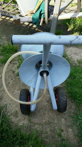 Carpet cleaning pressure washing hose reel