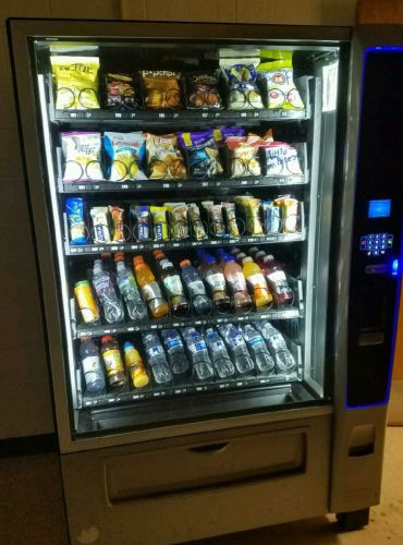 Crane 472D Merchant media 6 combo vending machine