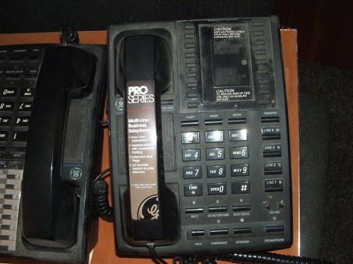 Five (5)  four (4) line GE business phones