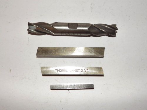 A 3/4&#034; Double end endmill and 3 new High Speed Tool bits