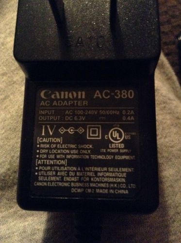 GENUINE CANON AC-380 AC ADAPTER INPUT: AC 100-240V 50/60Hz OUTPUT: DC 6.3V 0.4A