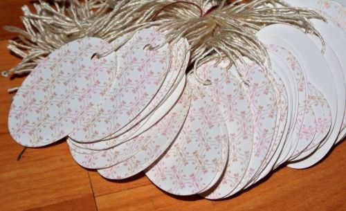 Lot 200 oval romantic pink print 1 x 1 5/8  merchandise price tags string strung for sale