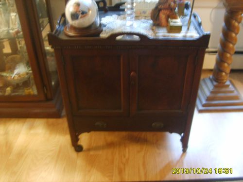 Vintage liquor cabinet on wheels circa 1940&#039;s w/ removable glass tray top for sale