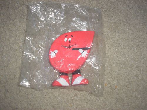 New Sealed Commerce Bank Mini Squeezable Figure 3 1/2 inches x 3 inches