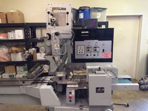 Sato giken kogyo horizontal flow wrapper with markem imaje printer for sale