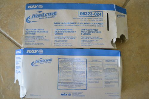 Kay multi-surface and glass cleaner and Scotch Brite box of pads