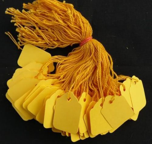 100 yellow strung price tags 32 x 22 mm traditional tie on swing tags free post for sale