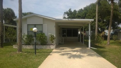 1991 HOMES OF MERIT SW 2BR/2BA MOBILE HOME IN PARK WITH CARPORT PUNTA GORDA FLO